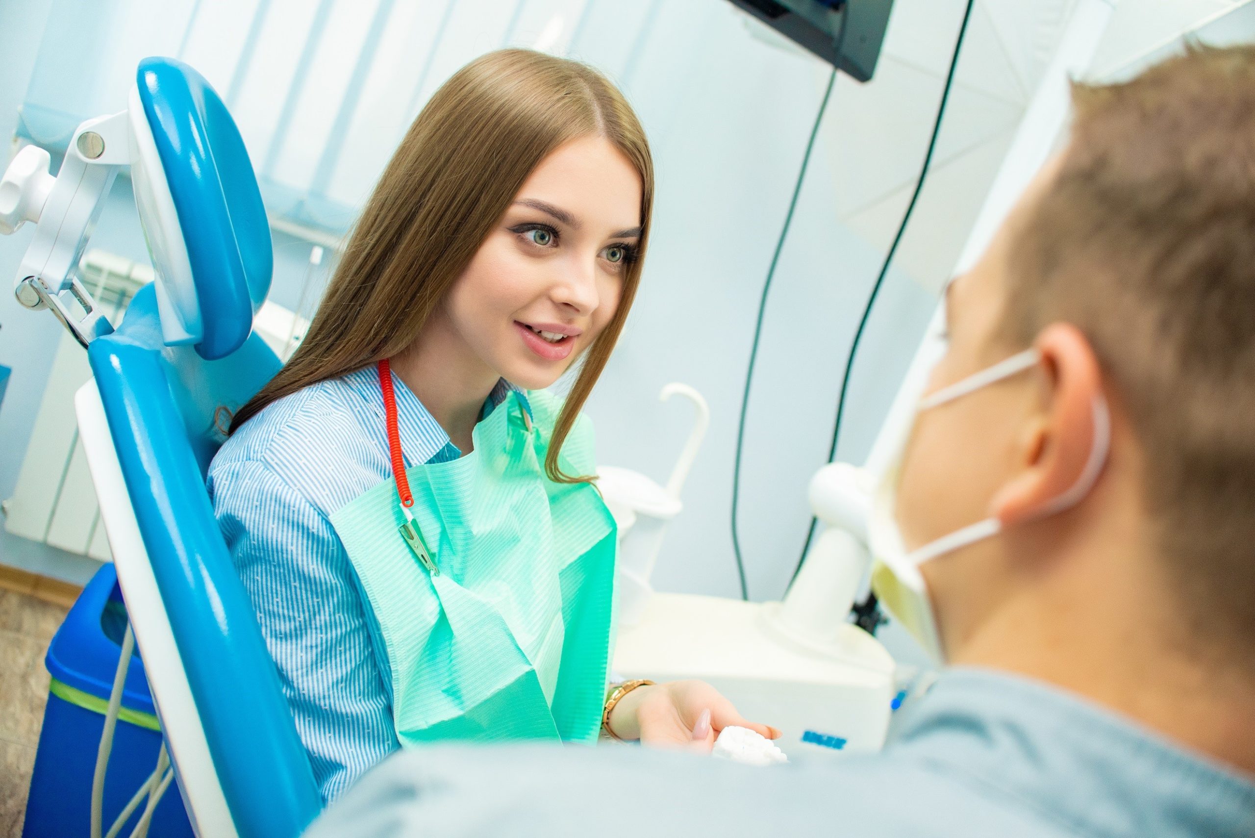 Woman at dentist for a dental checkup.